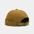 Detailed view of brown canvas brimless docker cap with adjustable metal back strap. - Adjustable / Camel