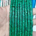 Detailed close-up of green malachite stone spacer beads on strings for DIY jewelry - Malachite