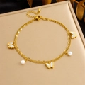 Detail of gold double-layered anklet featuring butterfly pendant and white pearls - Double Layer Pearl MOP Butterfly Style (B1587)
