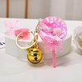 Pink and gold lollipop keychain with sequins and silicone strap on a white stand - Snowflake Lollipop [Pink]