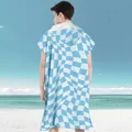 Light blue wavy checkerboard adult hooded beach poncho in quick-dry microfiber fabric - Pull-over Style - Blue Checkerboard