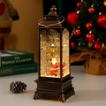 Detalle de farol de Navidad vintage con Papá Noel y efecto de nieve brillante en movimiento - Papá Noel Estacionario con Farola