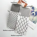 Three density variants of black diamond mesh fishnet tights displayed on white boards - XL / Plain Medium Mesh Fishnet / Black