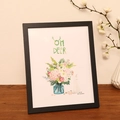 Minimalist black wooden photo frame 8x10 inch size with matte texture on wood table - Black