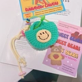 Détail du mini sac tissé main vert avec visage souriant et breloques en perles - A05 Visage Souriant Vert