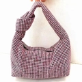 Pink rhinestone handbag with signature knotted handle and sparkling crystals - Pink