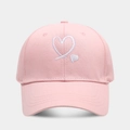 Detailed close-up of pink baseball cap featuring white heart embroidery and stitching - Adjustable / Pink