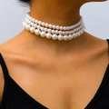 Three-layer bohemian white pearl choker necklace displayed on a model for elegant styling - SY312-Three Layer Pearl Vintage Choker Necklace