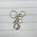 Cute panda keychain with golden rings, bamboo leaf charm and enamel panda pendants - Eating Bamboo Panda