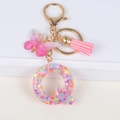Pink sequin letter Q keychain with resin butterfly and tassel on gold ring - Letter Q