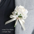 Cream rose boutonniere with baby's breath and gold-edged ribbon on grey suit lapel - Ivory