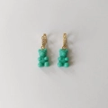 Golden huggie hoop earrings with micro-inlaid stones and blue gummy bear charms - Chic Blue