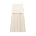 Detailed view of cream-colored layered skirt featuring elegant pleated texture and waist design - S / Pleated Skirt / Off White