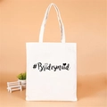 White canvas bridesmaid tote bag with black #Bridesmaid text and heart print - Style I (#Bridesmaid/Black)