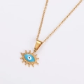 Macro detail of golden evil eye necklace with sunburst edge and light blue enamel pendant - Gold Color Sky Blue Eye