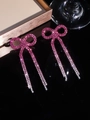 Pink bow tassel earrings with sparkling rhinestones and gradient silver finish - Stud Earrings / Rose White Gradient