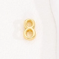 Macro view of gold number eight bead for 10mm stainless steel mesh bracelet - Number 8