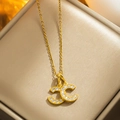 Elegant gold-tone double C pendant necklace featuring sparkling white crystal inlay - 8978 Gold Cc