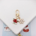 Detail of Christmas keychain with gold clasp, red Santa hat and white snowflake charms - Christmas Hat & Snowflake