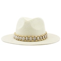 Detail of straw hat with natural cowrie shell and wooden bead bohomian decorative band - Creamy White
