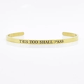 Golden 4mm stainless steel cuff bracelet engraved with This Too Shall Pass quote - THIS TOO SHALL PASS