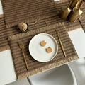 Brown and jute woven paper table mat with decorative fringe trim in a set of three - Jute Fringe Mixed Coffee