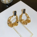Detailed shot of golden flower earrings with rectangular black stone on white display card - 17# 925 Sterling Silver Earring Post - Gold Wrinkled Black Stone