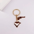 Detail of Western cowboy keychain with brown revolver and enamel triangle scarf charms - Brown Pistol & Bandana