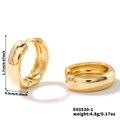 Detailed view of gold huggie earrings showing 1.7cm diameter and 0.5cm width dimensions - Chunky Hoop