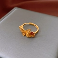Macro shot of gold-plated butterfly and flower ring with zircon inlay and open design - 22# Ring - Gold - Butterfly Flower