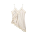 Detail of champagne satin camisole featuring delicate lace trim and irregular hem - Off White