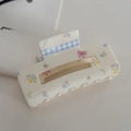 Detail of floral hair claw clip with blue plaid ribbon and purple bow decoration - Cream Beige Rectangle