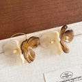 Bohemian acrylic flower tassel earrings with dual-tone cream and amber petals - Earring Hooks / White-Coffee