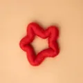 Vibrant red plush star-shaped holiday ornament with fluffy faux mohair texture - Red Hollow Star