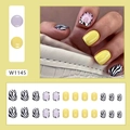 Kurze gelbe und lila Press-on-Nägel im Set mit schwarzen und weißen Zebramuster-Designs - Gelbes Zebramuster W1145 (Kleber-Stil)