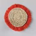 Bohemian round woven straw wall decor with bright orange raffia fringe on grey background - Orange-Red Decorative Pendant (26cm)