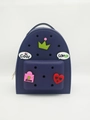 Dark blue silicone mini backpack featuring colorful DIY cartoon charms and hole pattern - Dark Blue
