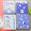 Blue A7 spiral notebook featuring cute shark cartoon patterns and happy shark lettering - Shark Album