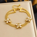 Pulsera de doble capa en acero inoxidable dorado con dijes de mariposas brillantes - Estilo de Mariposa Incrustada (B2012)