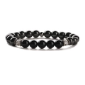 Beaded bracelet with black stones, silver spacers and crystal beads on white background - Hematite