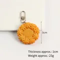 Realistic orange PVC cookie keychain with silver metal lobster clasp and 5cm sun flower shape - Flower Round Cookie Lobster Clasp