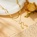 Collana a doppio strato in titanio dorato con ciondoli a quadrifoglio in madreperla - Oro