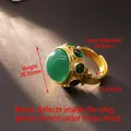 Vintage style adjustable gold ring featuring a large green oval gemstone and side crystals - D699 Emerald Style Open Ring