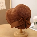 Japanese style brown woven sun hat with bow on wooden stand in warm home setting - M (56-58cm) / Caramel color
