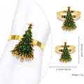 Golden napkin ring featuring a green enamel Christmas tree with red rhinestone accents - Christmas Tree Style 84