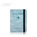 Light blue faux leather passport cover with elastic strap and engraved travel wallet logo - Strap Passport Cover / Light Blue
