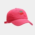 Close-up of bright pink cotton baseball cap with detailed cherry embroidery on front - Adjustable / Rose Red