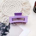 Close-up of matte purple rectangular hair claw clip on a white woven background - Medium Matte Square Claw-Lavender Purple