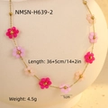 Detail of pink floral pendant necklace on mannequin with size specifications - Gold Pink Rose Flower (NMSN-H639-2)