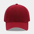 Detail view of burgundy baseball cap featuring a white sandwich brim and twill texture - Adjustable / Burgundy